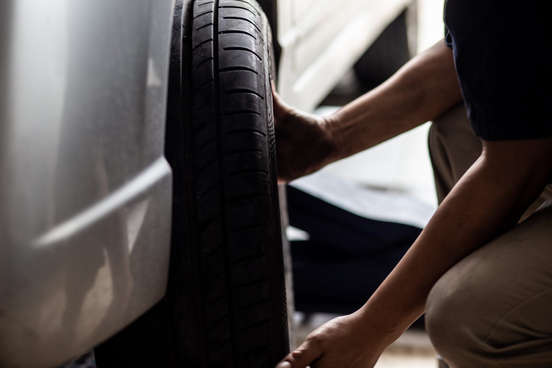 Car tire chang and check working in garage new tire